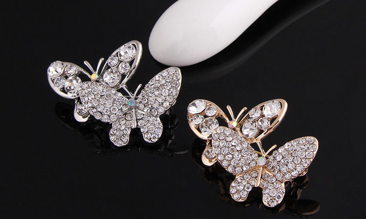 Elegantná brošňa v tvare dvoch krásnych motýľov v striebornej a zlatej farbe