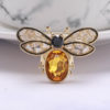 Luxusná brošňa v podobe včielky so žltým kryštálom