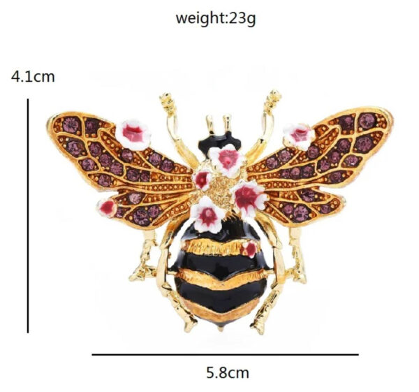 Zlatá brošňa na šaty v podobe prepracovanej včielky